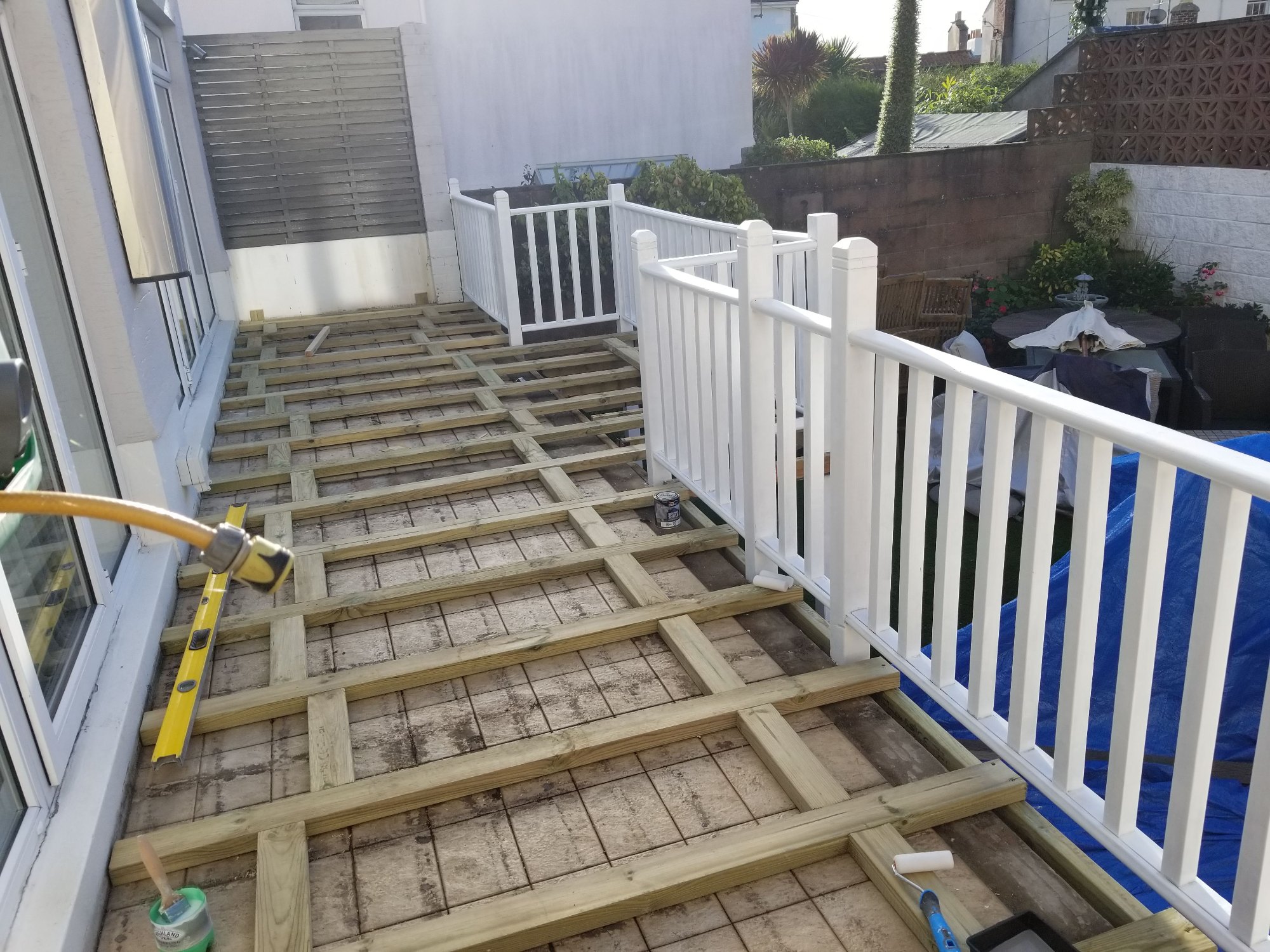 New subframe and primed balustrade A new pressure-treated timber subframe was constructed, while the balustrade received a protective primer coat.